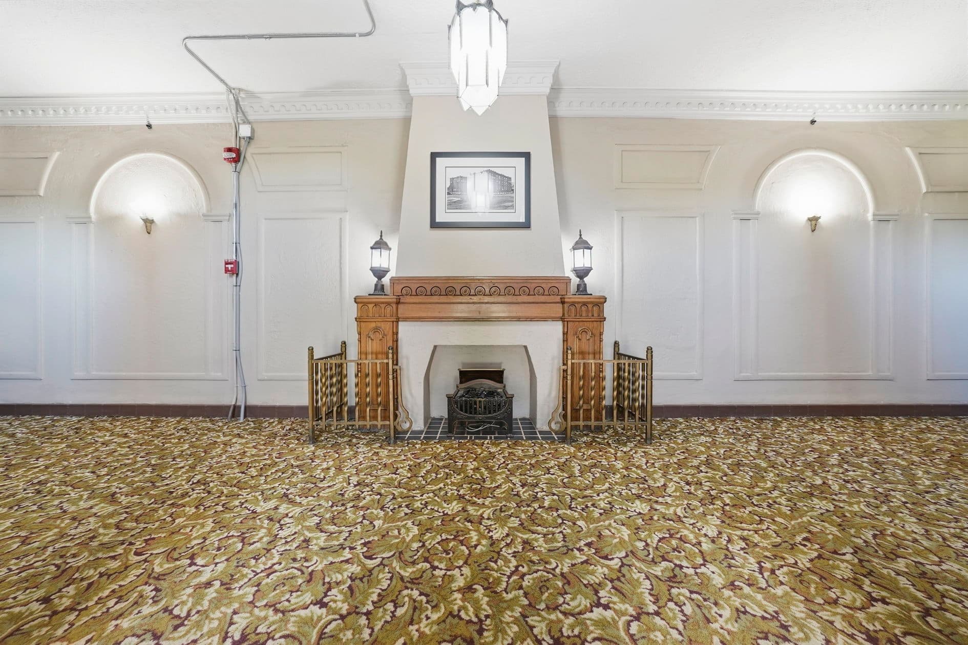 Cambridge Apartments — heritage lobby with fireplace