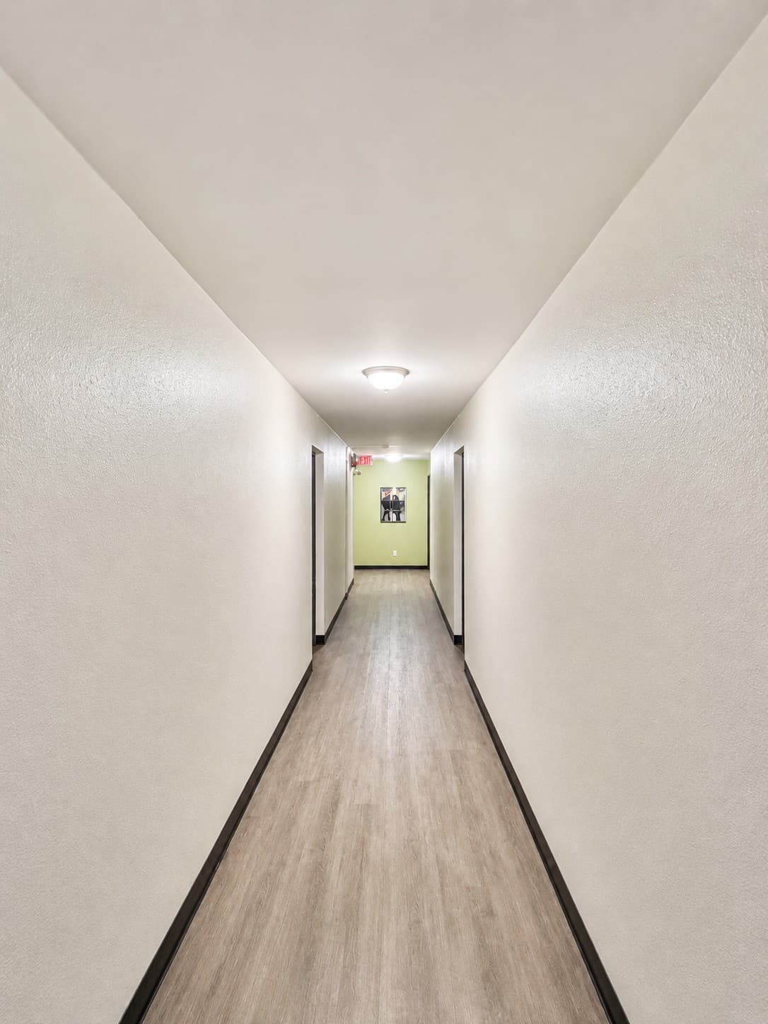 Midtown Apartments — renovated interior hallway