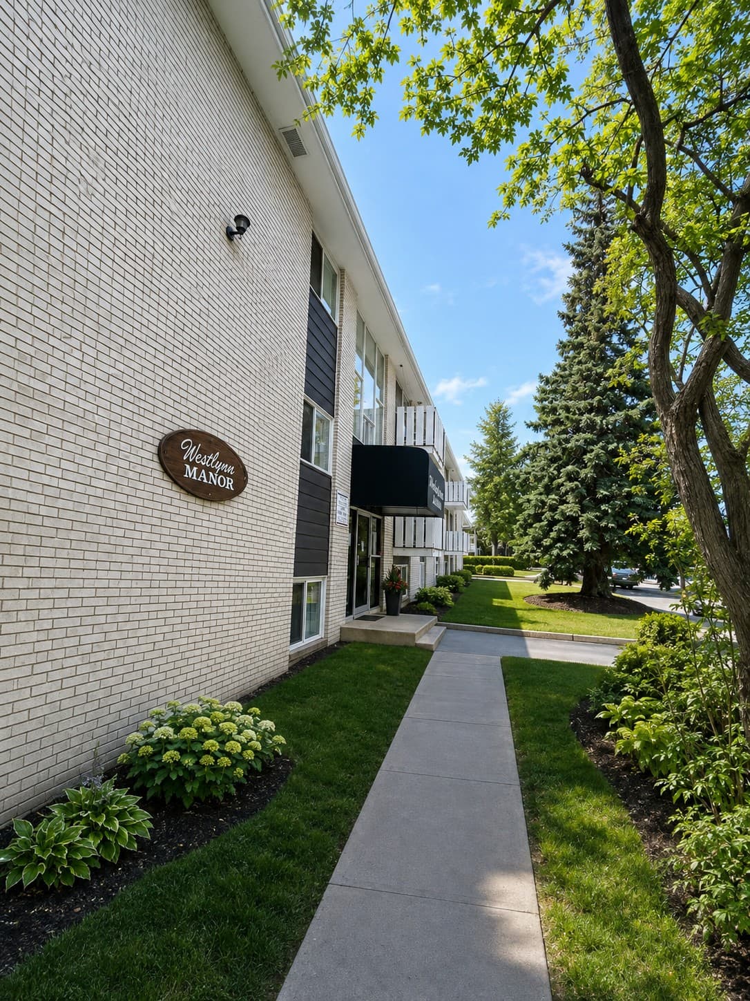 Westlynn Apartments — side exterior and entrance walkway
